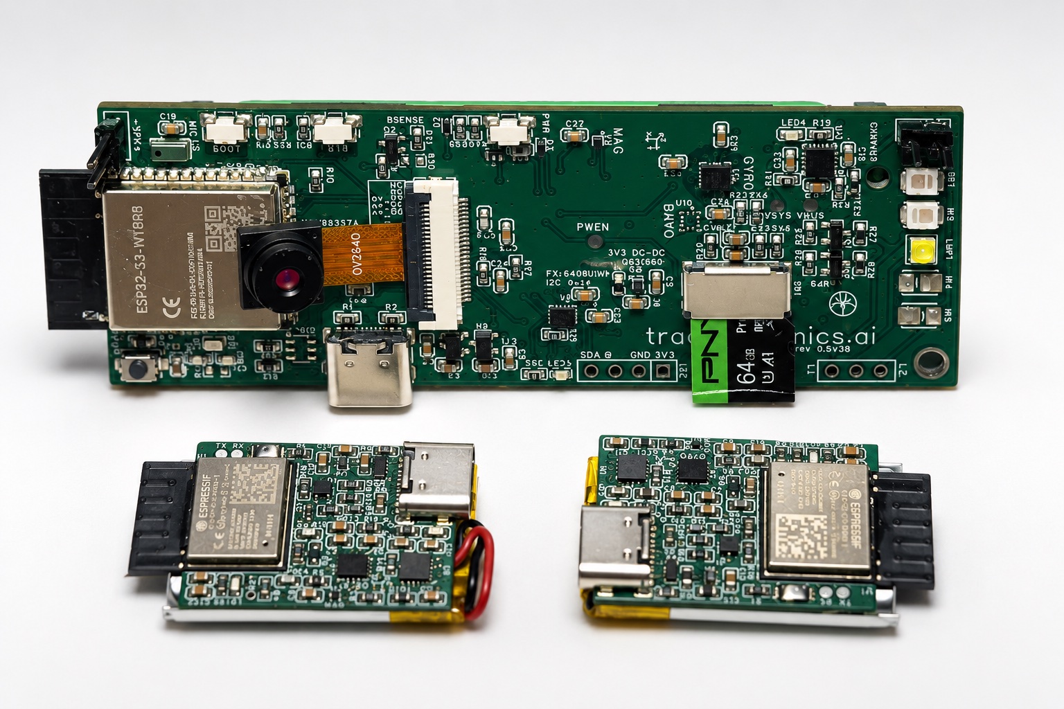 The built TRACE hardware — the MMT board with camera, sensors, storage, and radio, and two LMT motion-sensor boards